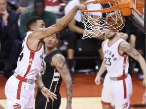 Toronto Raptors guard Norman Powell (24) dunks the ball against the Milwaukee Bucks during the second half of Game 5 of an NBA first-round playoff series basketball game in Toronto on April 24, 2017.