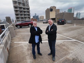 Mark Boscariol, left, and Mark Schincariol are shown on the top level of the Pelissier Street parking garage on March 1, 2017.