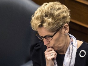 Premier Kathleen Wynne gets questioned on the Liberal ad campaign to cut hydro rates during question period at Queen's Park in Toronto, Ont., on March 20, 2017.