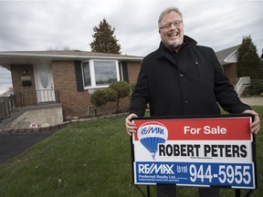 Real estate Bob Peters is pictured in front of a home for sale at 2906 Grandview St. in Windsor on Wednesday April 5, 2017.