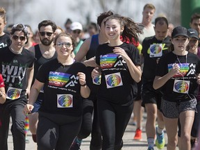 Runners in the 5th and final Run for Rocky make their way along the riverfront at Dieppe Gardens on April 9, 2017.