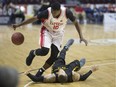 Windsor's Warren Ward, left, is fouled by London's Joel Friesen during NBL of Canada action at WFCU Centre, Sunday, April 23, 2017.