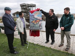 Tourism Windsor Essex Pelee Island announced the launch of two communication pieces on April 21, 2017 at the Point Pelee National Park in Leamington. John Paterson, Leamington mayor, left, Nelson Santos, Kingsville mayor and chair of TWEPI, Gordon Orr, CEO TWEPI, and Louis Lavoie from Parks Canada unveil the cover art of the new visitor guide.