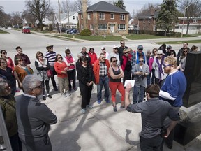 A group of approximately fifty people take part in the South Walkerville walking tour Sunday, April 9, 2017.