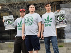 Marijuana advocates John-Paul Patterson (left), Joshua Jacquot (centre) and Adam Allard (right) hold up promotional materials for the 420 Festival to be held in Windsor on April 20, 2017.