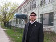 City of Windsor councillor Chris Holt stands next to the old Lufkin Rule building on Caron Avenue in Windsor on April 19, 2017. The City of Windsor wants a demolition permit to tear down the former Lufkin Rule Building, built around 1904, which is on the heritage register. Holt thinks the building should be saved.