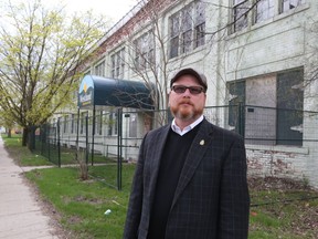 City of Windsor councillor Chris Holt stands next to the old Lufkin Rule building on Caron Avenue in Windsor on April 19, 2017. The City of Windsor wants a demolition permit to tear down the former Lufkin Rule Building, built around 1904, which is on the heritage register. Holt thinks the building should be saved.