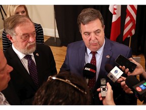 Windsor-Detroit Bridge Authority CEO Michael Cautillo and Windsor-Detroit Bridge Authority Board Chair Dwight Duncan speak with the media on April 28, 2017 at Mackenzie Hall in Windsor.