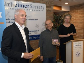 From left, president of Ground Effects Ltd. Jim Scott, caregiver Bakhus Saba, and Alzheimer Society of Windsor and Essex County CEO Sally Bennett Olczak, address the media during a news conference on April 4, 2017. Scott announced that Ground Effects will match up to $25,000 for all donations received during the CaregiverRx campaign.