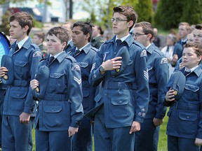 Members of Royal Canadian Air Cadets 364 Lancaster Squadron with caps over their hearts during Battle of the Atlantic ceremony at Dieppe Park, May, 2017.