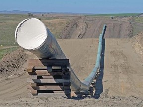 FILE - In this Sept. 29, 2016, file photo, shows a section of the Dakota Access pipeline under construction near St. Anthony in Morton County, N.D. North Dakota regulators are investigating whether the developer of the pipeline removed too many trees while laying pipe in the state. A report from a third-party inspector identified more than 80 sites where trees might have been improperly cleared. Energy Transfer Partners denies violating terms of its permit. And its plan for replacing trees calls