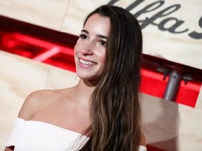 FILE - In this Feb. 3, 2017, file photo, Aly Raisman attends ESPN: The Party 2017 in Houston, Texas. Raisman used Twitter on May 24, 2017, to call out an airport security worker who she says questioned whether she had enough muscles to be a gymnast. (Photo by John Salangsang/Invision/AP, File)