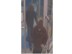 Windsor police have released surveillance photos of two masked men who robbed a pharmacy May 8, 2017.