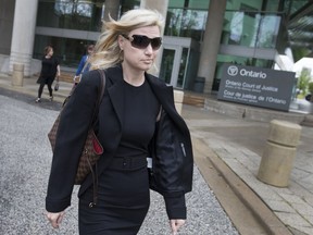 Christina Albini, a former teacher, leaves the Ontario Court of Justice after pleading guilty to sexual interference on May 1, 2017.