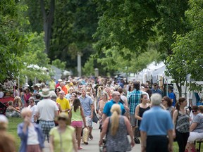Attendees of Art in the Park fill Windsor's Willistead Park in Juene 2016.