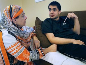 Shabana Shahab is shown with her son Abdullah Yar Khan, 16, at their Windsor home on May 9, 2017. The highly autistic young man has been excluded from school and there are no government supports for his parents.