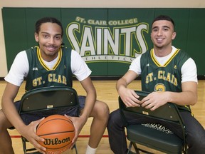 Glynn Willis-Paris, 18, left, and Ali Mansour, 19, both Kennedy Collegiate students, picturedon May 31, will be attending St. Clair College to play basketball.