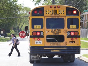 A school bus drops a student off at Cedarview and Frank in Windsor on May 16, 2017. An Ontario MPP is pushing to allow photos from cameras on school buses to be used in court.