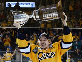 Erie Otters centre Dylan Strome carries the J. Ross Robertson Cup after the Otters won the OHL championship over the Mississauga Steelheads with a 4-3 win in overtime in Game 5 of the OHL hockey final in Erie, Pa., on May 12, 2017.