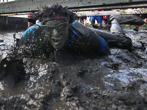 A participant is covered in mud during the annual Heart Breaker Challenge on Saturday, May 27, 2017 at Malden Park. The event raises money for the Cardiac Wellness and Pulmonary Rehab Centre at Hotel-Dieu Grace Healthcare.
