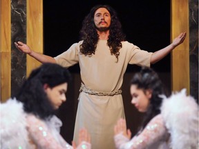 The Windsor Light Music Theatre is preparing to present a production of Jesus Christ Superstar. Lead actor Sean Sennett, who plays Jesus, is shown with angels Dalton Hickson, left, and Ruby Romero during rehearsal at the Chrysler Theatre on May 4, 2017, in Windsor.