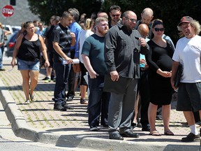 Job seekers pack the Caboto Club in this  July 30, 2015 photo.