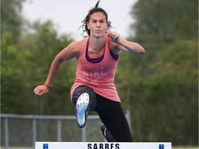 Essex native Kelsey Balkwill works out at the Sandwich Secondary School track on May 17, 2017.