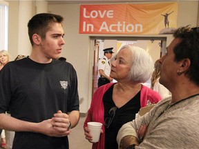 Recovering addict Lawson Veilleux, left, speaks with Roberta Jarecsni of South Shore Health Centre and Lawson's stepfather Carlo Antinozzi, right, during Not My Kid: Opioids and Adolescents Community Forum at Kingsville Community Centre on May 24, 2017.