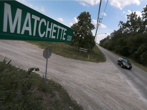 A car travels down Matchette Road near the Ojibway Nature Centre in Windsor on July 14, 2016.
