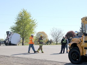 Emergency crews were on scene after a tanker and a school bus collided at Grande River Line and Jacob Road on May 9, 2017.