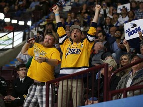 Erie Otters fans cheers on their team in a game against the Saint John Sea Dogs during the Memorial Cup tournament on Friday, May 26, 2017, at the WFCU Centre in Windsor.