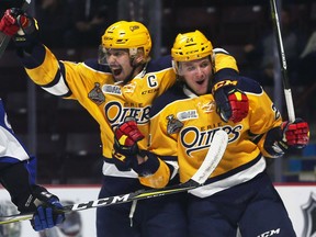 Dylan Strome, left, and Darren Raddysh of the Erie Otters celebrate Raddysh's  first-period goal against the Saint John Sea Dogs during the Memorial Cup tournament on Friday, May 26, 2017, at the WFCU Centre in Windsor.