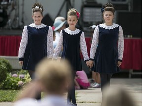 Members the Emerald Isle Dance Society performs in front of the St. Angela Merici Church for the 28th annual St. Angela Merici street festival on Aug 9, 2015.