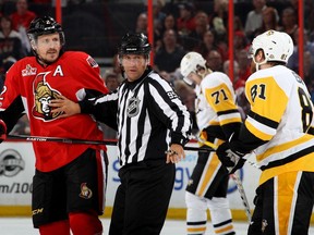 Ottawa's Dion Phaneuf, left, and Pittsburgh's Phil Kessel have some words during the second period of Game 3 of the NHL's Eastern Conference final at Canadian Tire Centre on May 17, 2017 in Ottawa.