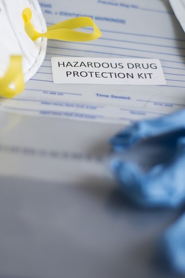 A hazardous drug protection kit, including a mask, rubber gloves, and bleach wipes, is pictured at Windsor Police headquarters on May 19, 2017.