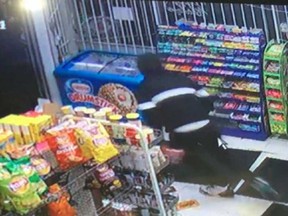 A security camera image of one of the suspects that robbed Elias Convenience at 61 Shepherd St. East on the night of May 4.