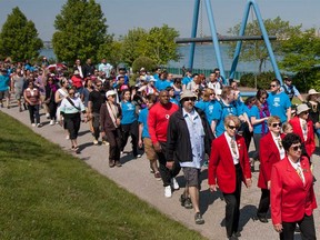 Citizens stroll on Windsor's riverfront for the annual Mayor's Walk in this May 2016 file photo.