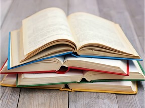 A stack of books on the table. Photo by Getty Images.