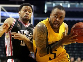 The London Lightning's Junior Cadougan drives past Windsor's Maurice Jones in the fourth quarter of their second playoff game on May 14, 2017 against the Windsor Express at Budweiser Gardens. The Lightning squeaked out a 106-105 win on a buzzer beater by Gareth Williamson.