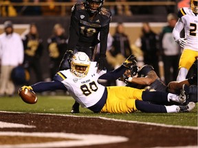 Michael Roberts of the Toledo Rockets reaches over the goal line for a touchdown in the first quarter against the Western Michigan Broncos at Waldo Stadium on Nov. 25, 2016 in Kalamazoo, Mich.