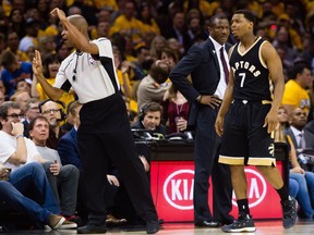 Referee Sean Corbin gives Kyle Lowry of the Toronto Raptors a technical foul during the second half of Game 2 of the NBA Eastern Conference semifinals against the Cleveland Cavaliers at Quicken Loans Arena on May 3, 2017 in Cleveland, Ohio. The Cavaliers defeated the Raptors 125-103.