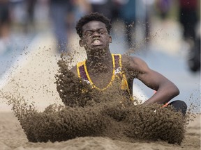 Catholic Central's Roberto Say competes in the senior boys' long jump on the final day of the WECSSAA track and field championships at the University of Windsor Stadium on May 11, 2017.