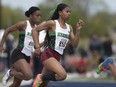 Jada Jackson, left, and Taneidra Cain helped the Herman Green Griffins win the gold medal in the senior girls' 4x100-metre relay on June 2, 2017, at the OFSAA track and field championship in Belleville. The pair are shown competing at the WECSSAA track and field meet on May 11, 2017 in Windsor.