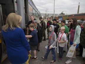 Students from Grades 5 and 6 board a VIA Rail train at the Walkerville Train Station on May 23, 2017, for the VIA Rail Safety Train program and Education Expo that will drop them off at the WFCU Centre. The program is part of the 2017 MasterCard Memorial Cup activities.