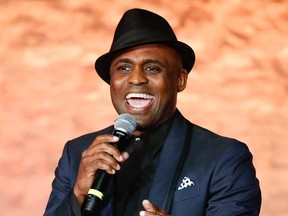 Comedian Wayne Brady speaks from a stage in Beverly Hills in May 2016.