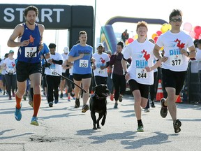 Serious runners head out on the 5-km portion of the 1st annual Run For Windsor on May 13, 2017  to help support the Windsor Regional Hospital's Urgent Care Centre plan.