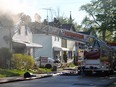 Amherstburg firefighters battles a house fire early Tuesday morning in the 100 block of Gore Street. Everyone in the home escaped.