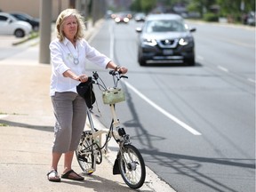 Lori Newton, executive director of Bike Windsor Essex, is spotted at the corner of Wyandotte Street East at George Avenue in Windsor, Ont., on May 18, 2017.