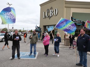 OPSEU members and LCBO workers hold an information rally outside of the LCBO store at the Roundhouse Centre in Windsor on May 19, 2017.