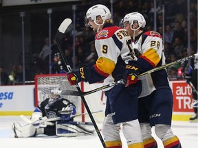 Erie Otters captain Dylan Strome is congratulated by teammate Anthony Cirelli after Strome scored a second-period goal against the Saint John Sea Dogs during the Memorial Cup tournament at the WFCU Centre in Windsor, Ontario on May 21, 2017.